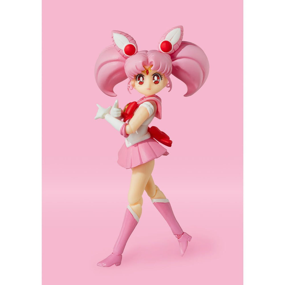 Sailor Chibi Moon Animation Color Edition SH Figuarts Action Figure - A 3.9-inch (10cm) tall articulated figure of Chibi Moon from the Sailor Moon series. Includes face plates, replacement wrists, alternate bangs, pink moon stick, and pedestals.