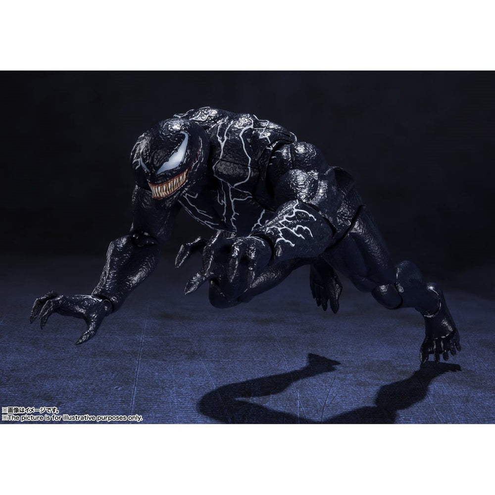 
                  
                    A detailed S.H.Figuarts Venom action figure standing 7.5 inches tall, with optional parts including three alternate head sculpts, two pairs of interchangeable hands, and two back tentacles. A bonus Venom symbiote head and pedestal are also displayed.
                  
                