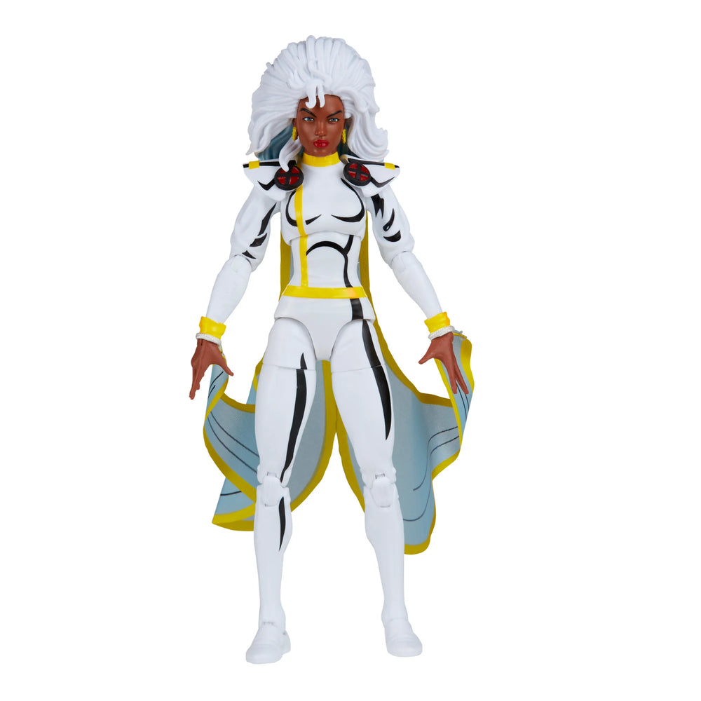 A 6-inch Marvel Legends Series X-Men Storm action figure in a classic white costume, accompanied by alternate hands with crackling electrical energy FX accessories, all contained in a '90s video cassette-inspired packaging.
