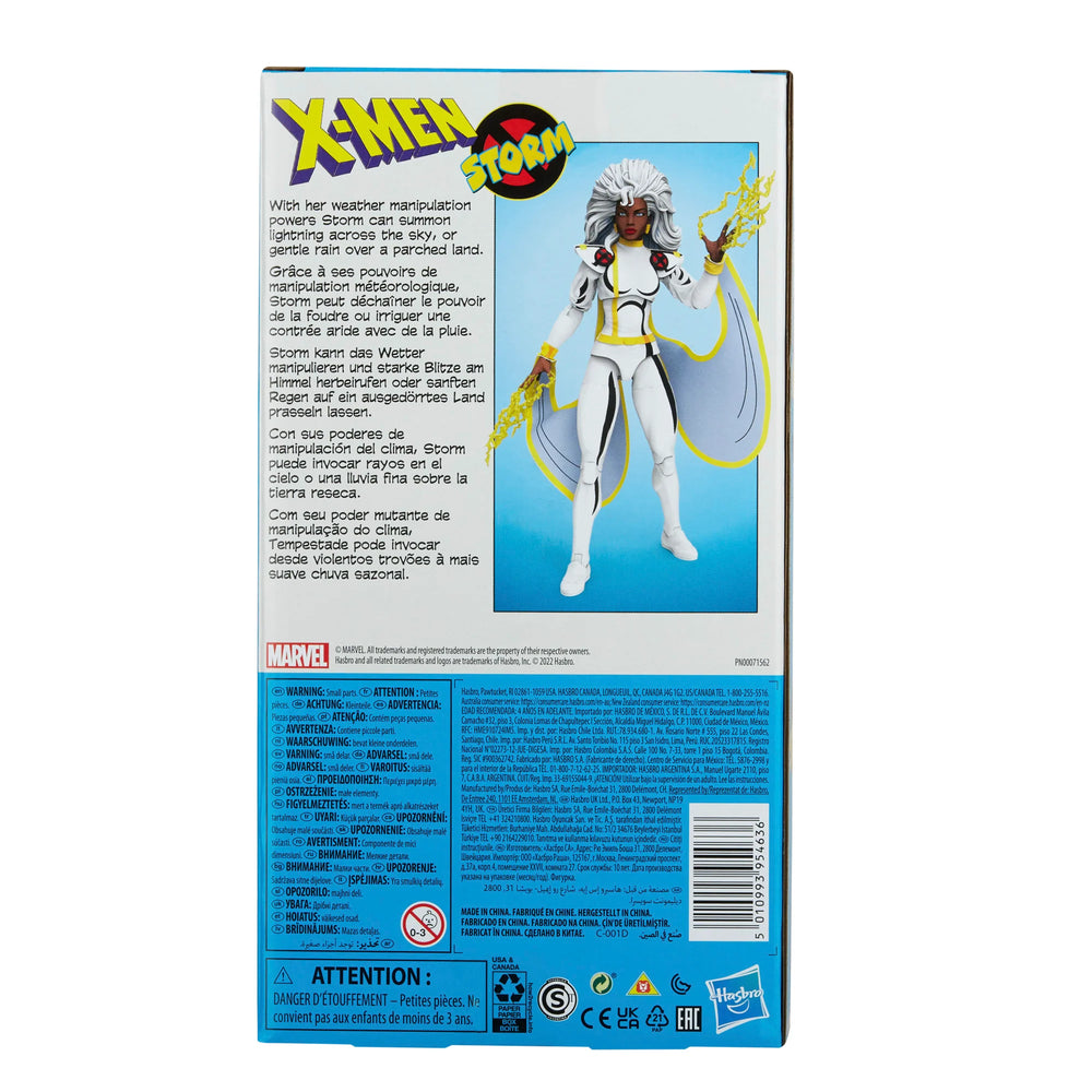 
                  
                    A 6-inch Marvel Legends Series X-Men Storm action figure in a classic white costume, accompanied by alternate hands with crackling electrical energy FX accessories, all contained in a '90s video cassette-inspired packaging.
                  
                