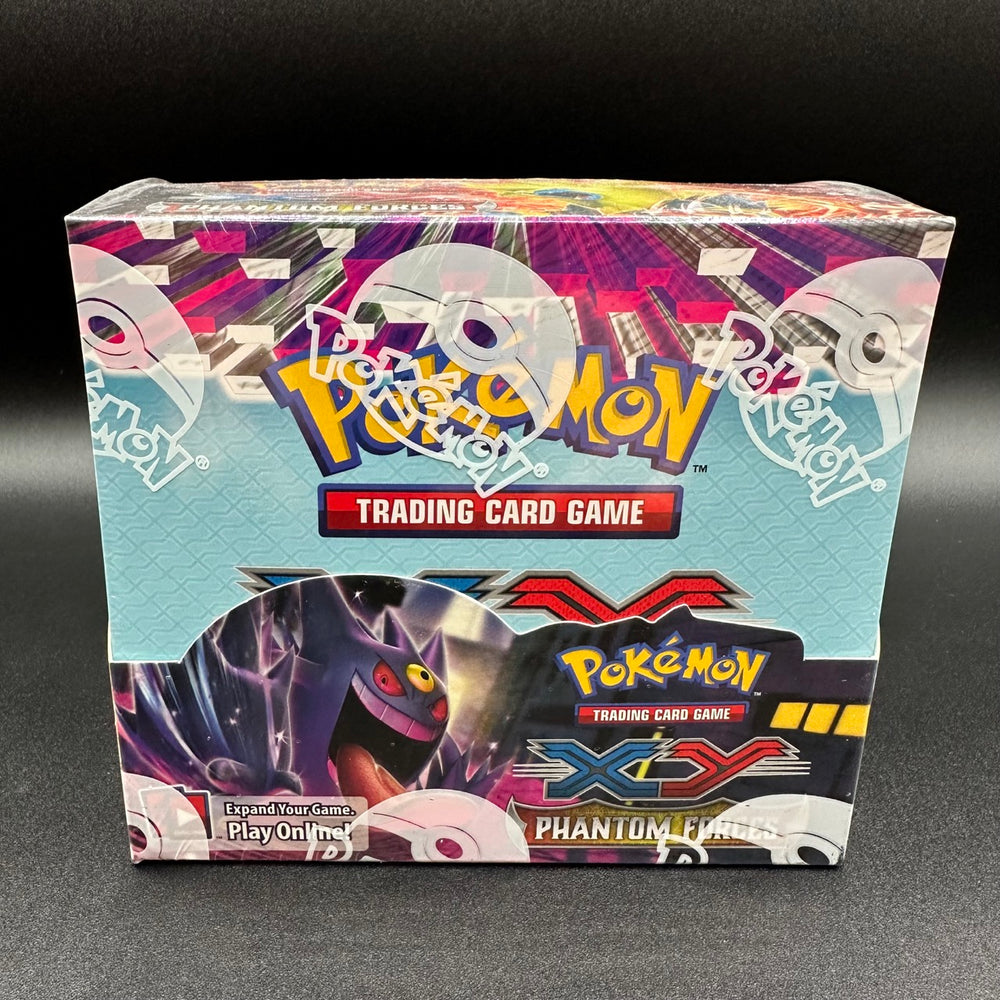 
                  
                    A box of Pokémon TCG: XY—Phantom Forces expansion showcasing 36 booster packs. The cover displays Mega Manectric-EX, Mega Gengar-EX, and Aegislash-EX ready for a battle.
                  
                