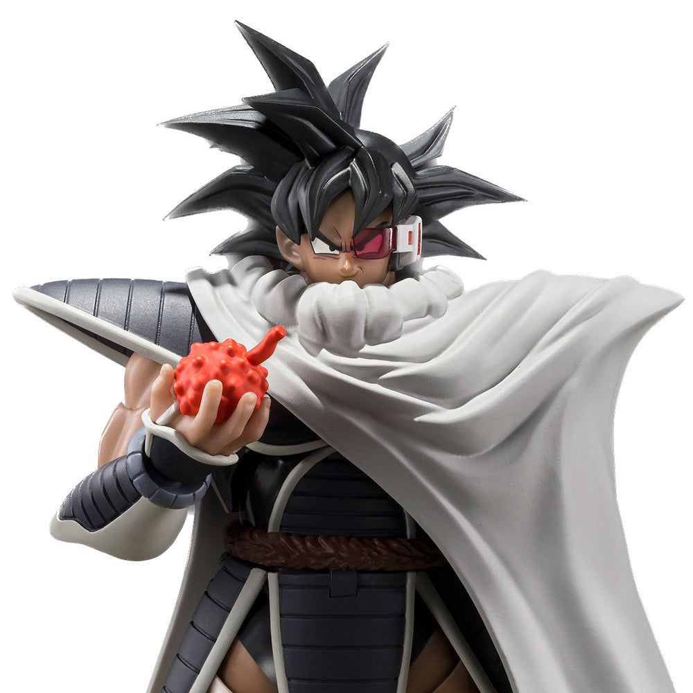 An articulated 5.7-inch S.H.Figuarts Turles action figure from Dragon Ball Z: The Tree of Might. The figure is detailed with various accessories including a hand holding the Tree of Might fruit, cape, crossed arms, and an energy attack effect.